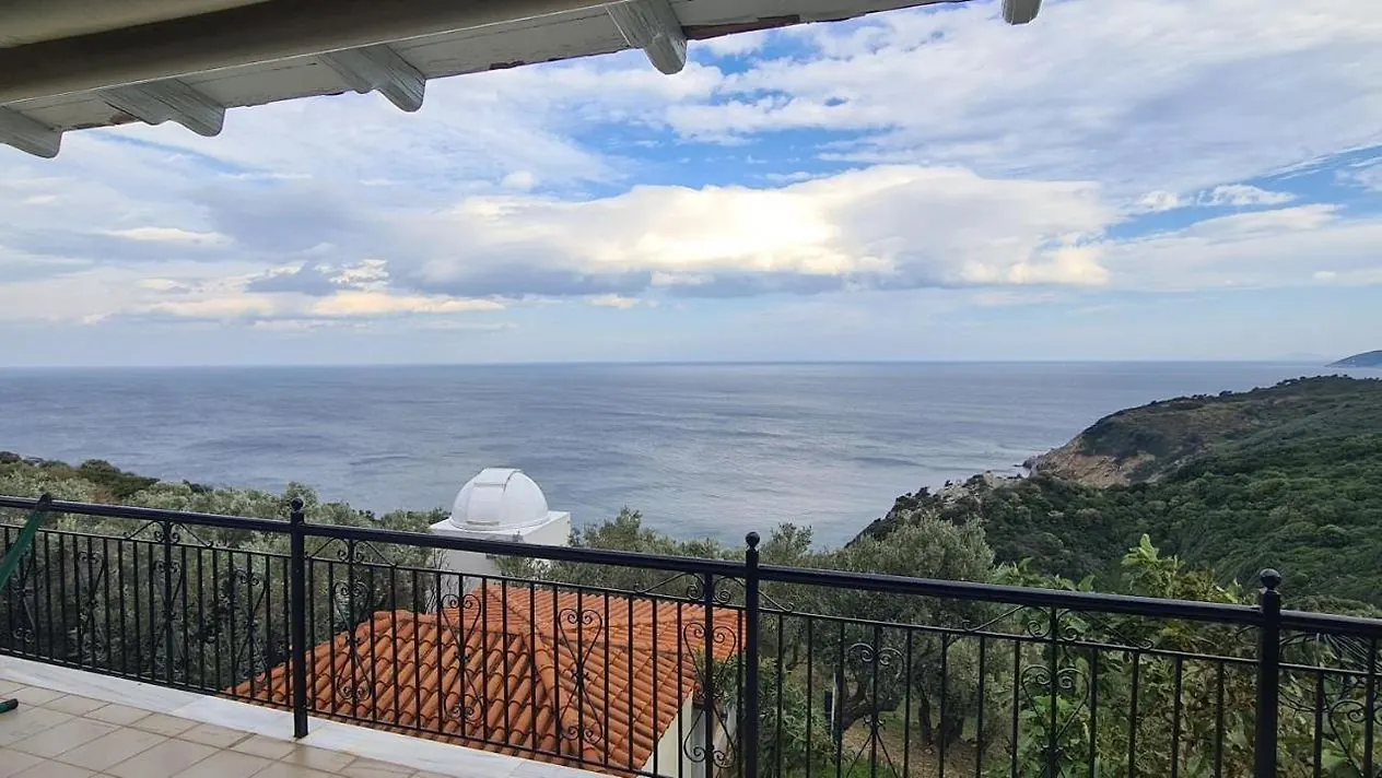 The sea and green hills from the balcony