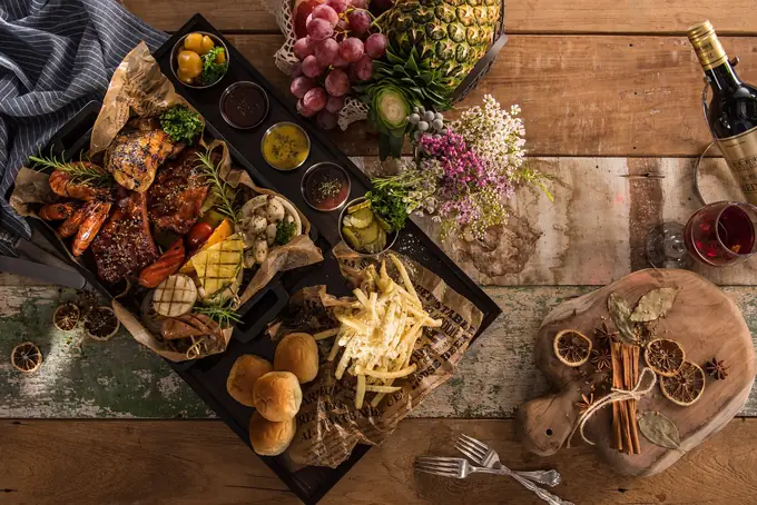 A dinner spread laid out on a wooden table