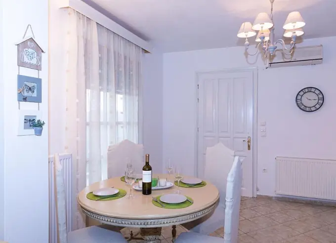Round dining table set for four